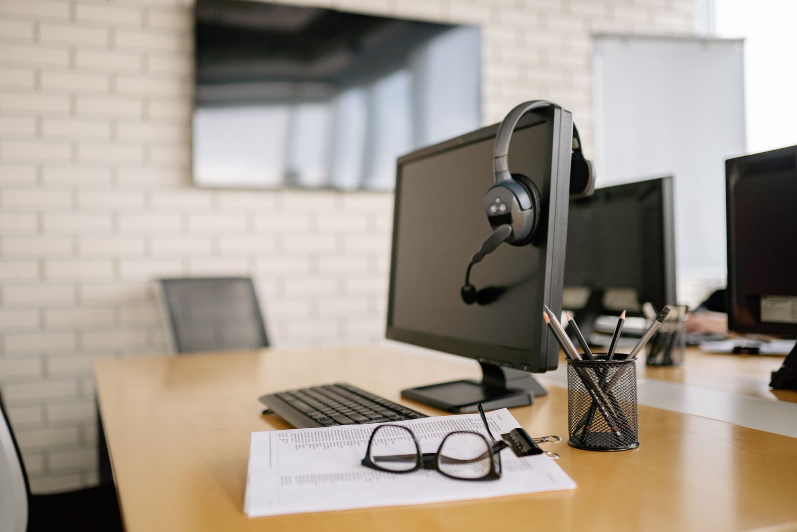 Service desk workstation with a headset.